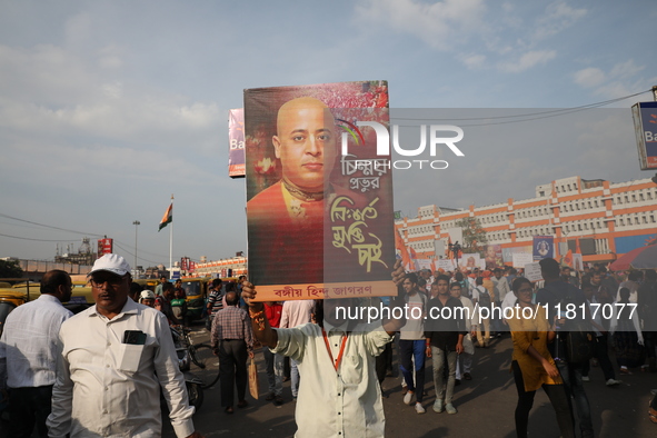 Members of Hindu Jagaran Monch shout slogans during a protest march towards the Bangladesh consulate against the recent arrest of ISKCON Ban...