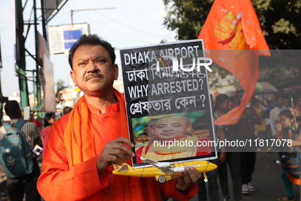 Members of Hindu Jagaran Monch shout slogans during a protest march towards the Bangladesh consulate against the recent arrest of ISKCON Ban...