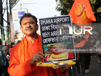 Members of Hindu Jagaran Monch shout slogans during a protest march towards the Bangladesh consulate against the recent arrest of ISKCON Ban...