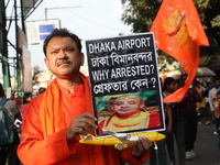 Members of Hindu Jagaran Monch shout slogans during a protest march towards the Bangladesh consulate against the recent arrest of ISKCON Ban...