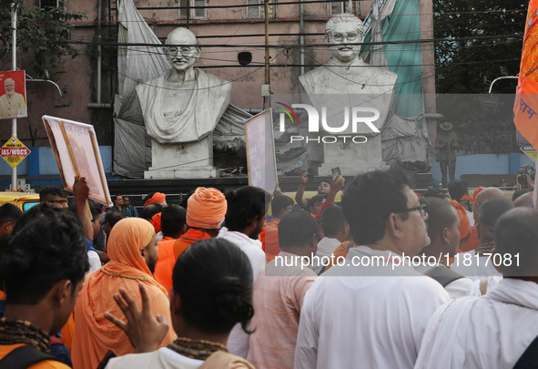 Members of Hindu Jagaran Monch shout slogans during a protest march towards the Bangladesh consulate against the recent arrest of ISKCON Ban...