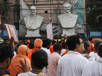 Members of Hindu Jagaran Monch shout slogans during a protest march towards the Bangladesh consulate against the recent arrest of ISKCON Ban...