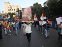 Members of Hindu Jagaran Monch shout slogans during a protest march towards the Bangladesh consulate against the recent arrest of ISKCON Ban...