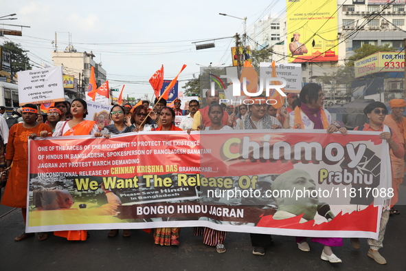 Members of Hindu Jagaran Monch shout slogans during a protest march towards the Bangladesh consulate against the recent arrest of ISKCON Ban...