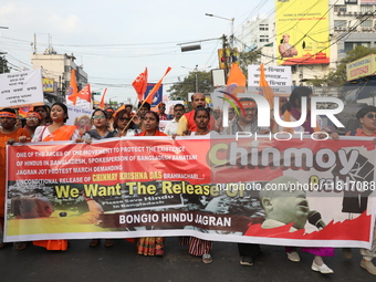 Members of Hindu Jagaran Monch shout slogans during a protest march towards the Bangladesh consulate against the recent arrest of ISKCON Ban...