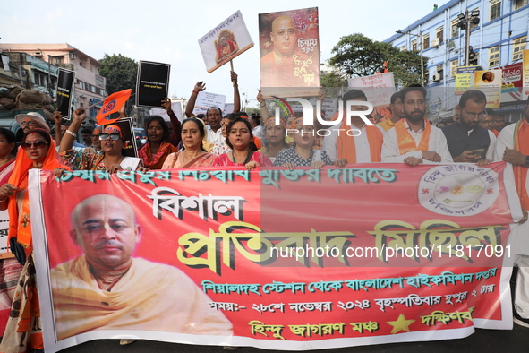 Members of Hindu Jagaran Monch shout slogans during a protest march towards the Bangladesh consulate against the recent arrest of ISKCON Ban...