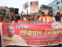 Members of Hindu Jagaran Monch shout slogans during a protest march towards the Bangladesh consulate against the recent arrest of ISKCON Ban...