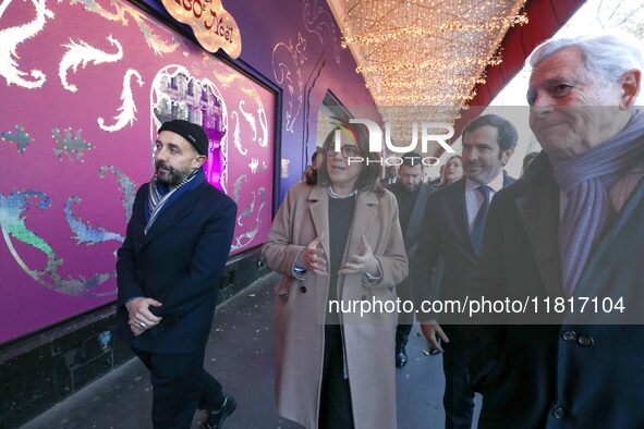 French Delegate Minister of Tourism Economy Marina Ferrari (2L), accompanied by Galeries Lafayette department store chairman Philippe Houze...