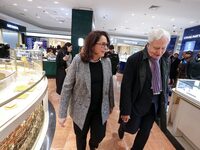 French Delegate Minister of Tourism Economy Marina Ferrari (center), accompanied by Galeries Lafayette department store chairman Philippe Ho...