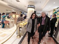 French Delegate Minister of Tourism Economy Marina Ferrari (center), accompanied by Galeries Lafayette department store chairman Philippe Ho...