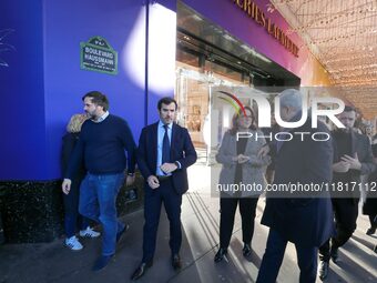 French Delegate Minister of Tourism Economy Marina Ferrari (center), accompanied by Galeries Lafayette department store chairman Philippe Ho...