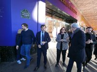 French Delegate Minister of Tourism Economy Marina Ferrari (center), accompanied by Galeries Lafayette department store chairman Philippe Ho...