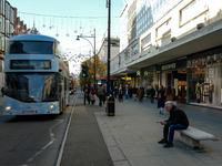 People walk on Oxford Street in London, United Kingdom, on November 28, 2024. (