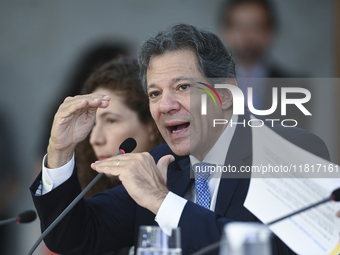 Brazil's Finance Minister, Fernando Haddad, holds a press conference at the Planalto Palace in Brasilia, Brazil, on November 28, 2024, to de...