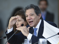 Brazil's Finance Minister, Fernando Haddad, holds a press conference at the Planalto Palace in Brasilia, Brazil, on November 28, 2024, to de...