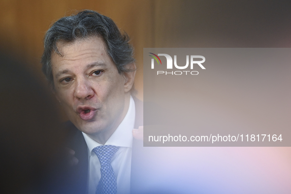 Brazil's Finance Minister, Fernando Haddad, holds a press conference at the Planalto Palace in Brasilia, Brazil, on November 28, 2024, to de...