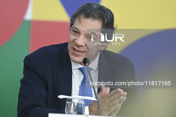 Brazil's Finance Minister, Fernando Haddad, holds a press conference at the Planalto Palace in Brasilia, Brazil, on November 28, 2024, to de...