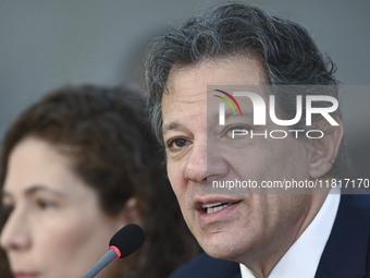 Brazil's Finance Minister, Fernando Haddad, holds a press conference at the Planalto Palace in Brasilia, Brazil, on November 28, 2024, to de...