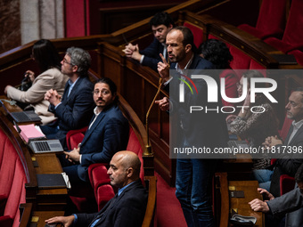 La France Insoumise deputy Manuel Bompard is in Parliament during the debate on the repeal of the pension reform in Paris, France, on Novemb...