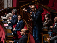 La France Insoumise deputy Manuel Bompard is in Parliament during the debate on the repeal of the pension reform in Paris, France, on Novemb...