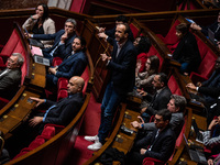 La France Insoumise deputy Manuel Bompard is in Parliament during the debate on the repeal of the pension reform in Paris, France, on Novemb...