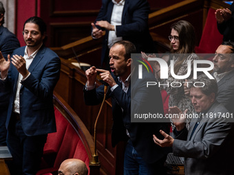 La France Insoumise deputy Manuel Bompard is in Parliament during the debate on the repeal of the pension reform in Paris, France, on Novemb...