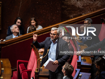 Ecologist and Social MP Alexis Corbier is in Parliament during the debate on the repeal of the pension reform in Paris, France, on November...