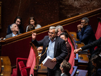 Ecologist and Social MP Alexis Corbier is in Parliament during the debate on the repeal of the pension reform in Paris, France, on November...