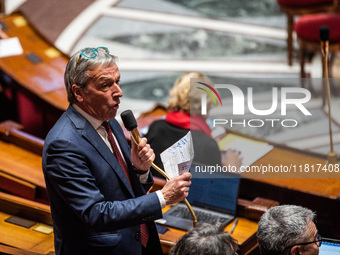 Democrat deputy Philippe Vigier is in Parliament during the debate on the repeal of the pension reform in Paris, France, on November 28, 202...