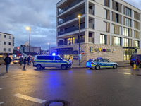 Police officers overpower a man on Bahnhofstrasse on November 28, 2024 (