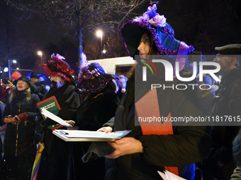 Women dressed as suffragettes take part in a rally in support of free and safe abortion in Warsaw, Poland, on November 28, 2024. A dozen wom...