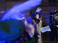 Agnieszka Czerederecka-Fabin, one of the founders of the feminist movement Women's Strike, dresses as a suffragette and takes part in a rall...