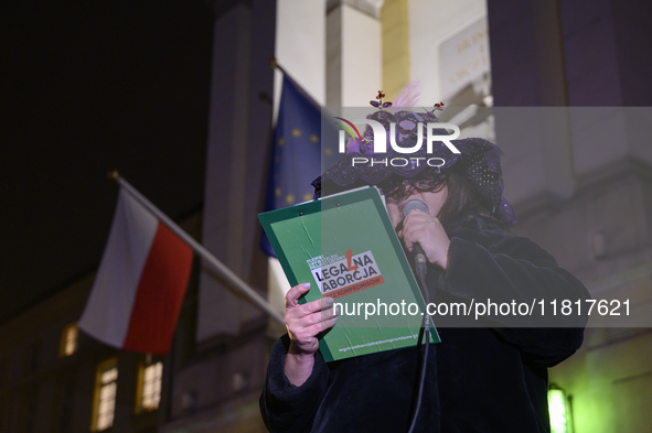 A woman dressed as a suffragette takes part in a rally in support of free and safe abortion in Warsaw, Poland, on November 28, 2024. A dozen...