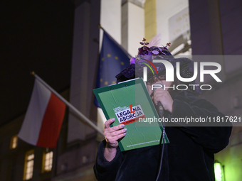 A woman dressed as a suffragette takes part in a rally in support of free and safe abortion in Warsaw, Poland, on November 28, 2024. A dozen...