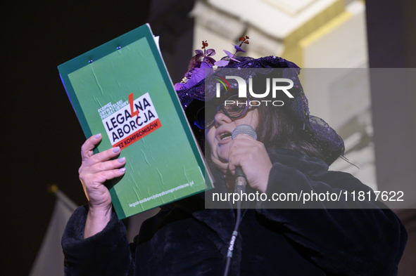 A woman dressed as a suffragette takes part in a rally in support of free and safe abortion in Warsaw, Poland, on November 28, 2024. A dozen...