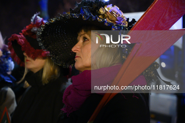 Women dressed as suffragettes take part in a rally in support of free and safe abortion in Warsaw, Poland, on November 28, 2024. A dozen wom...