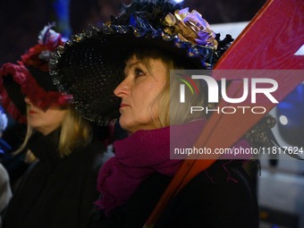 Women dressed as suffragettes take part in a rally in support of free and safe abortion in Warsaw, Poland, on November 28, 2024. A dozen wom...