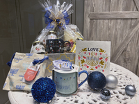 A gift basket is displayed at a shop for the upcoming Jewish holiday of Hanukkah (Chanukah) in Toronto, Ontario, Canada, on November 26, 202...