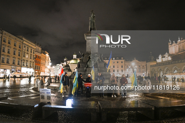 KRAKOW, POLAND - NOVEMBER 28:
On the evening of the 1009th day of Russia's invasion of Ukraine, a few members of the Ukrainian diaspora held...