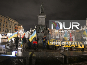 KRAKOW, POLAND - NOVEMBER 28:
On the evening of the 1009th day of Russia's invasion of Ukraine, a few members of the Ukrainian diaspora held...