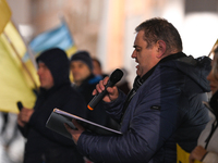 KRAKOW, POLAND - NOVEMBER 28:
Frenchman Henri Deluy joins members of the Ukrainian diaspora on the evening of the 1009th day of Russia's inv...