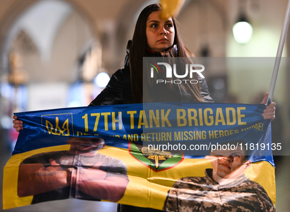 KRAKOW, POLAND - NOVEMBER 28:
On the evening of the 1009th day of Russia's invasion of Ukraine, a few members of the Ukrainian diaspora held...