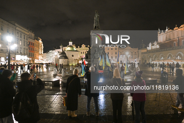 KRAKOW, POLAND - NOVEMBER 28:
On the evening of the 1009th day of Russia's invasion of Ukraine, a few members of the Ukrainian diaspora held...