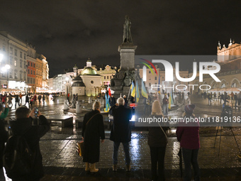 KRAKOW, POLAND - NOVEMBER 28:
On the evening of the 1009th day of Russia's invasion of Ukraine, a few members of the Ukrainian diaspora held...