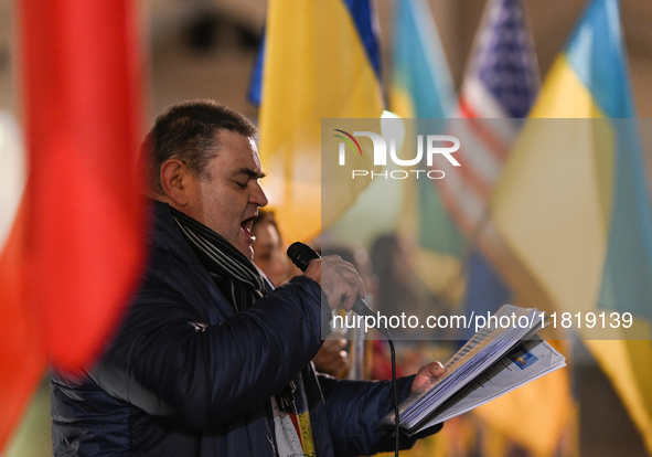 KRAKOW, POLAND - NOVEMBER 28:
Frenchman Henri Deluy joins members of the Ukrainian diaspora on the evening of the 1009th day of Russia's inv...