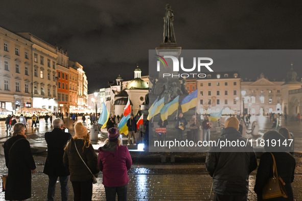 KRAKOW, POLAND - NOVEMBER 28:
On the evening of the 1009th day of Russia's invasion of Ukraine, a few members of the Ukrainian diaspora held...