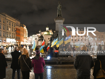 KRAKOW, POLAND - NOVEMBER 28:
On the evening of the 1009th day of Russia's invasion of Ukraine, a few members of the Ukrainian diaspora held...