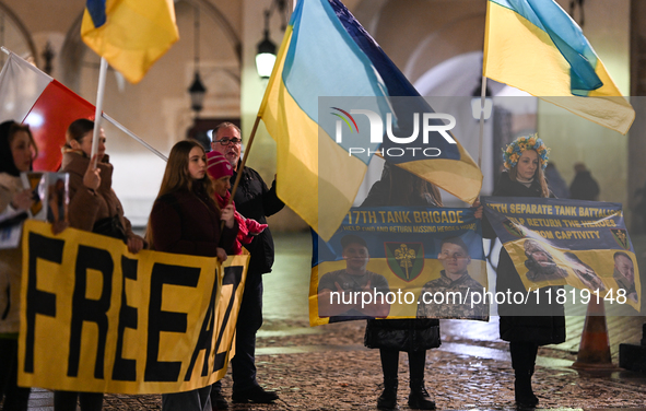 KRAKOW, POLAND - NOVEMBER 28:
On the evening of the 1009th day of Russia's invasion of Ukraine, a few members of the Ukrainian diaspora held...