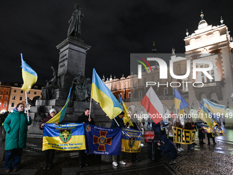 KRAKOW, POLAND - NOVEMBER 28:
On the evening of the 1009th day of Russia's invasion of Ukraine, a few members of the Ukrainian diaspora held...