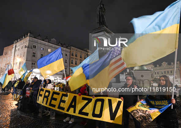 KRAKOW, POLAND - NOVEMBER 28:
On the evening of the 1009th day of Russia's invasion of Ukraine, a few members of the Ukrainian diaspora held...